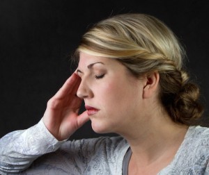 A woman with a headache
